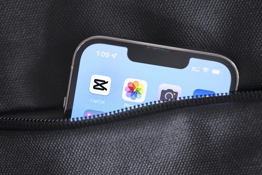 Best free AI video editing apps with CapCut on a smartphone screen