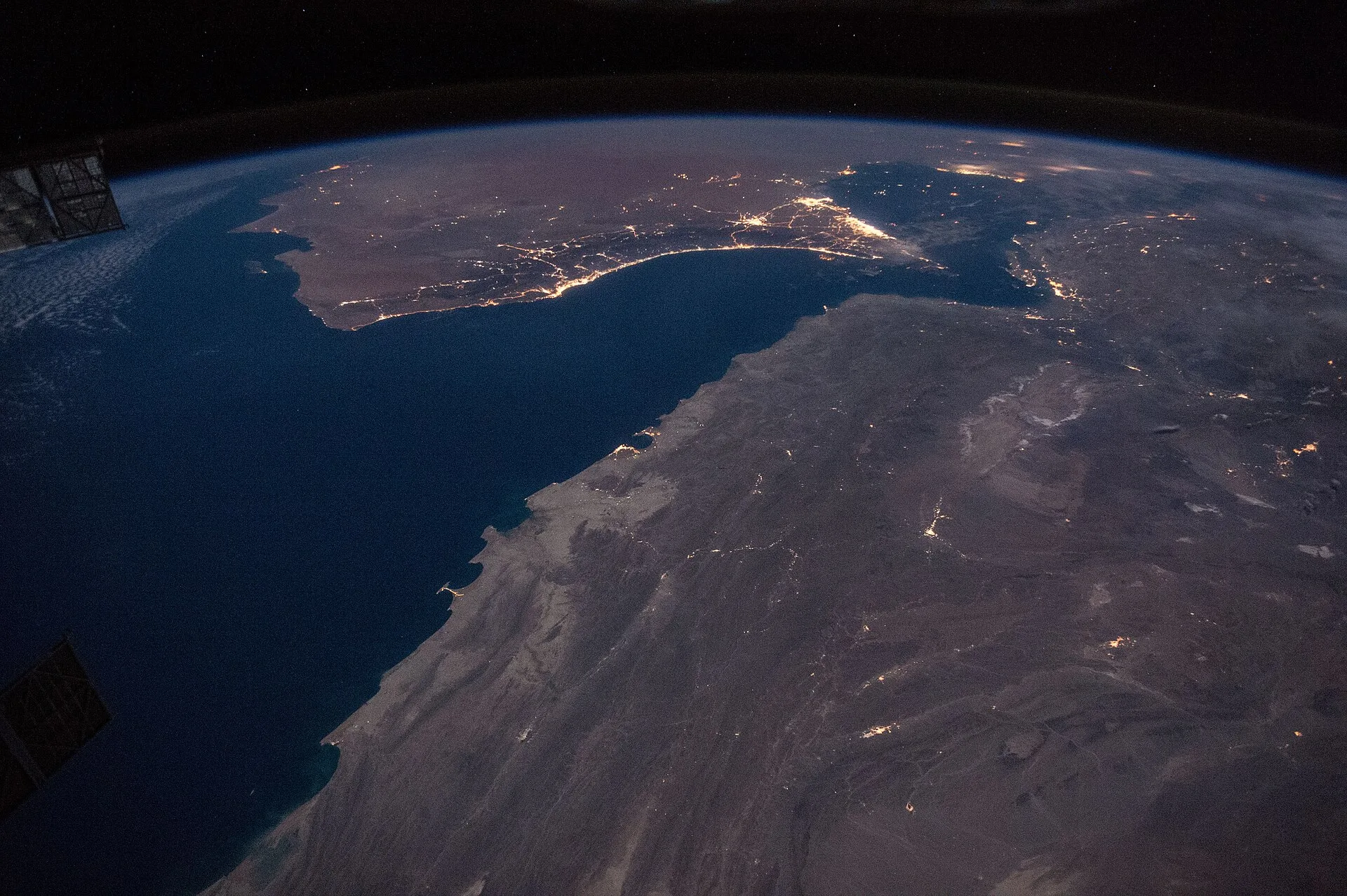 Strait of Hormuz oil tanker convoy near narrow shipping corridor