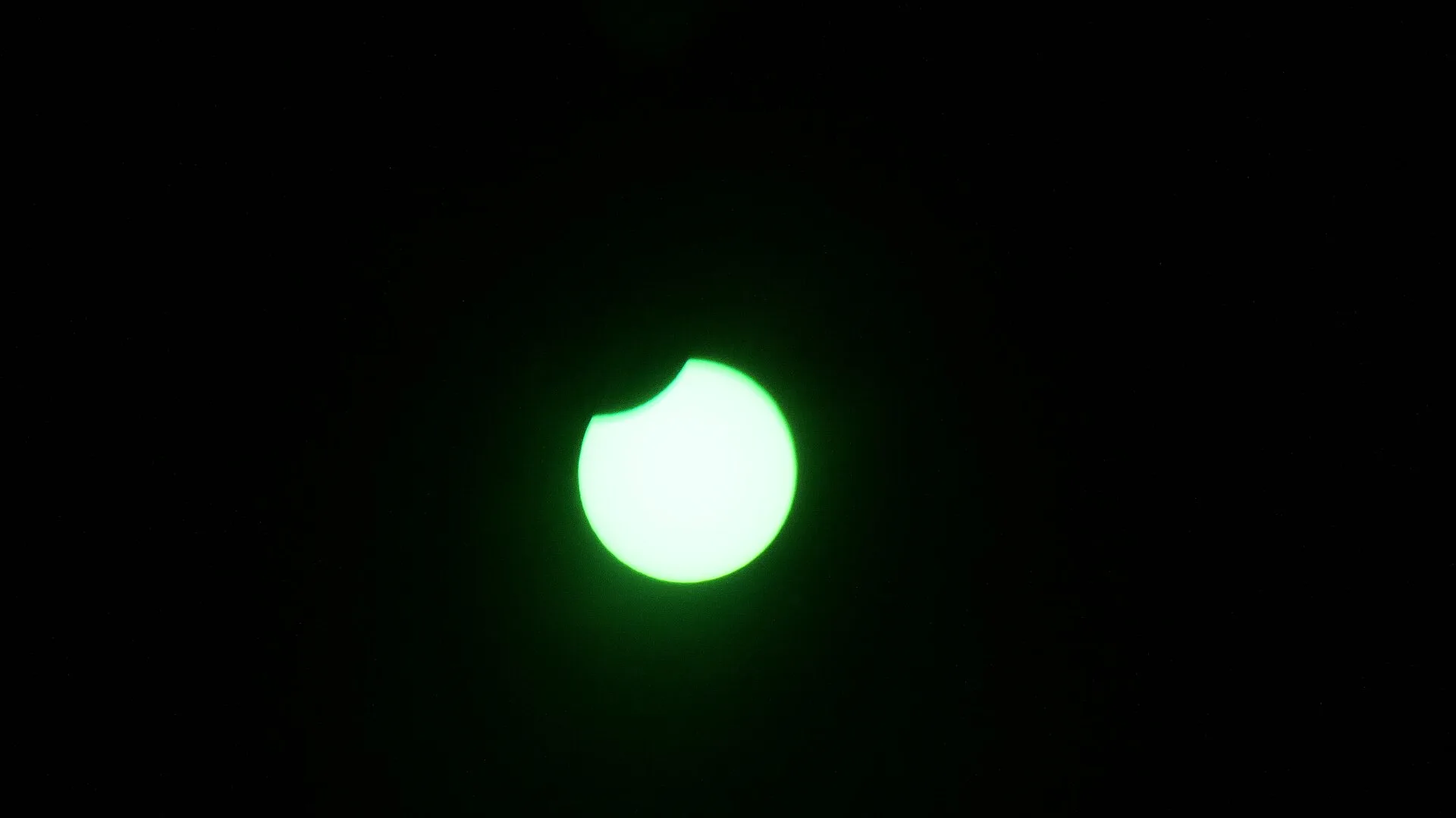 Crowd watching solar eclipse in Europe with eclipse glasses during best solar eclipse in 27 years